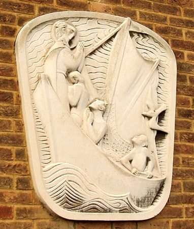 Emblem on the outside of St Nichoald Church