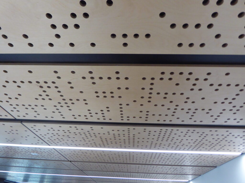 Ceiling panels resembling Jacquard Loom cards