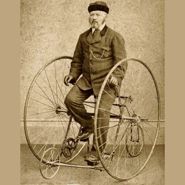 Old photo of James Startley on a Salvo tricycle