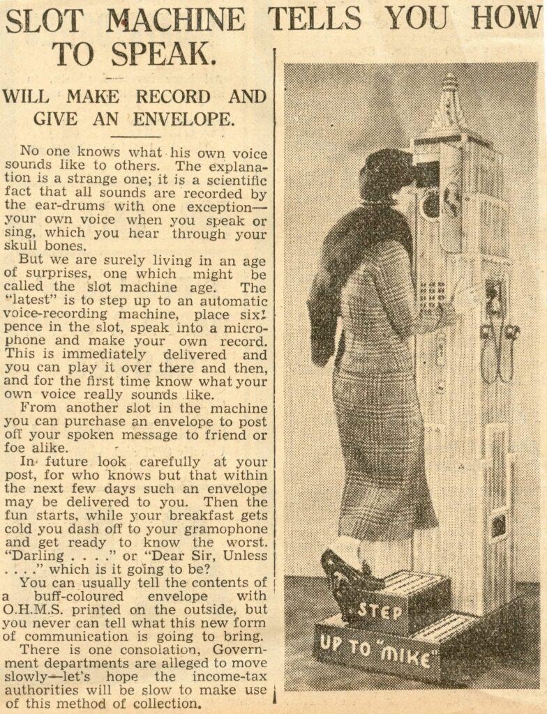 Newspaper cutting "Slot Machine TGells you how to speak" showing a lady speaking into a macnine